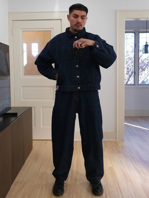 COLLUSION Unisex circular design collection antifit jeans in rinse with red topstitching