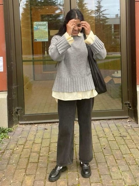 ASOS DESIGN Petite mid rise flare jeans in washed black